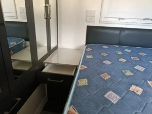 2015 New Age OZ Classic | Bed Side Table 1 | Find My Van | Caravan Broker | Caravan Sale Australia