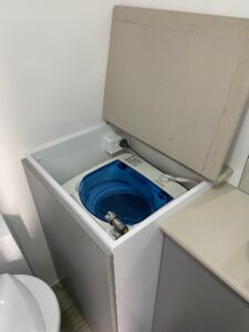 2025 Snowy River SRC 21 Find My Van Caravan Broker Caravan for Sale NSW Australia1 washing machine open